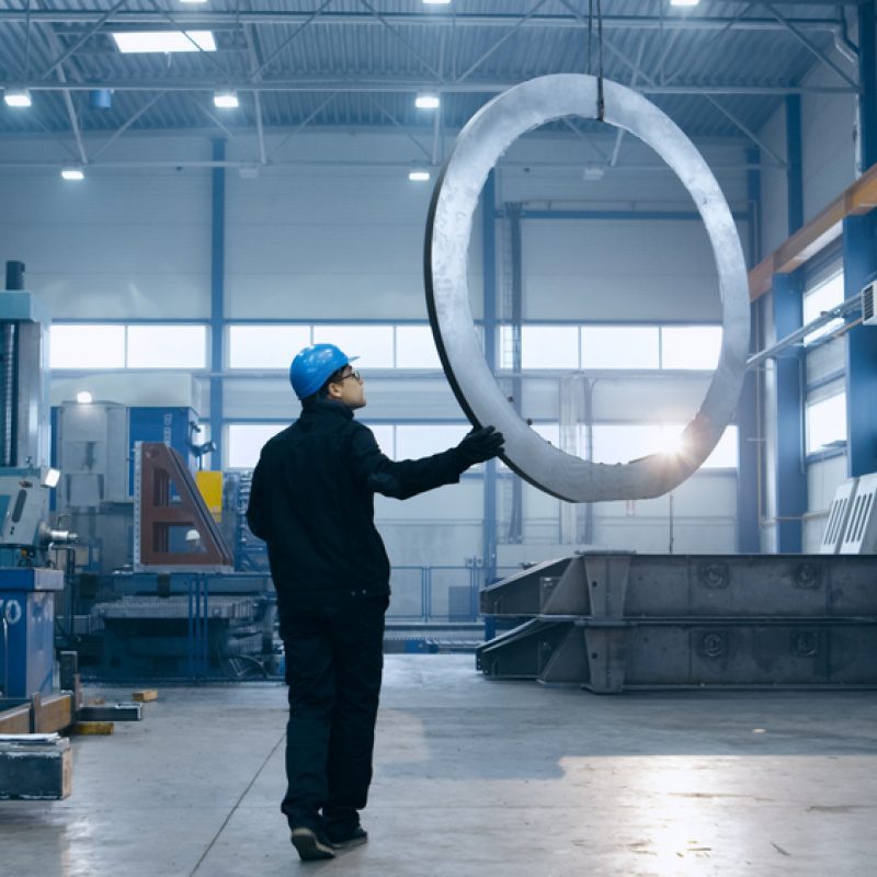 Factory,Worker,In,A,Hard,Hat,Is,Moving,A,Metal